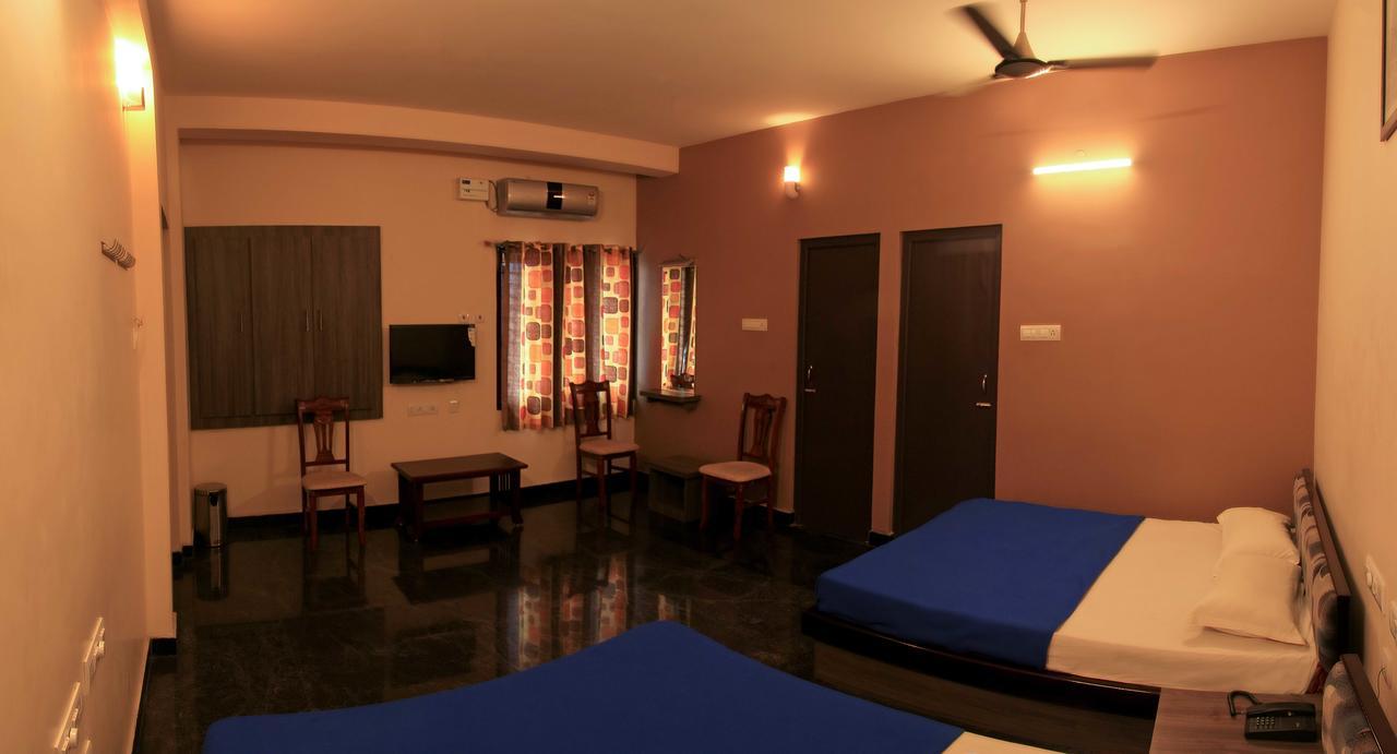 Hotel Sri Hayagriva Tiruchirappalli Pokoj fotografie